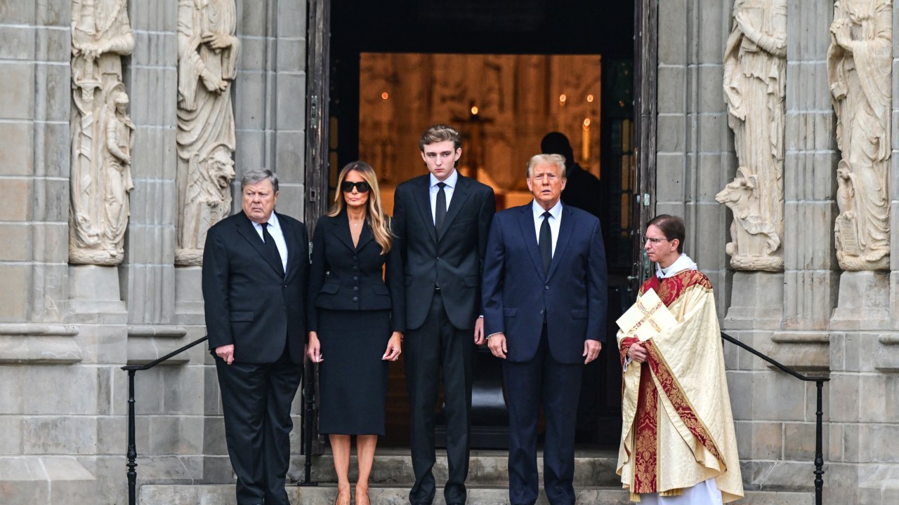 The president, first lady, and their children pose together outside a church, showcasing a moment of family unity and public service.